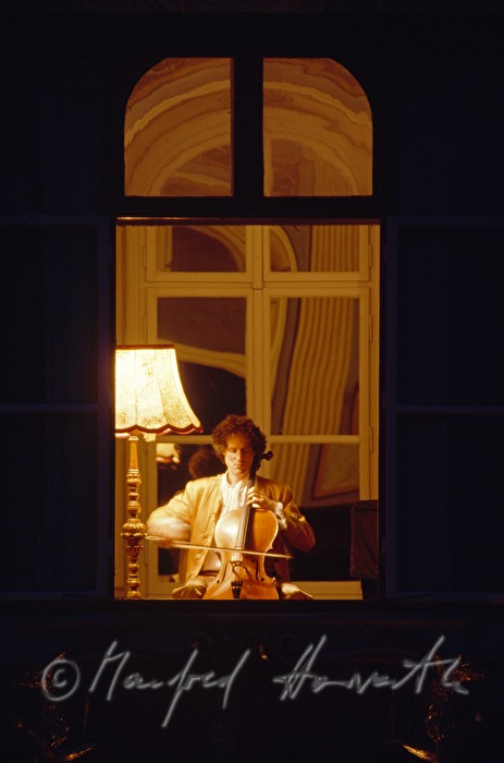 cello player rehearses for a concert in the Empirehall