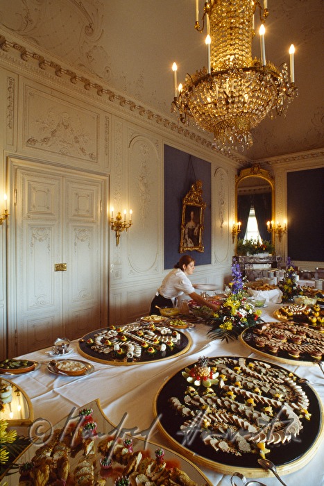 waitress in the salon with a buffet