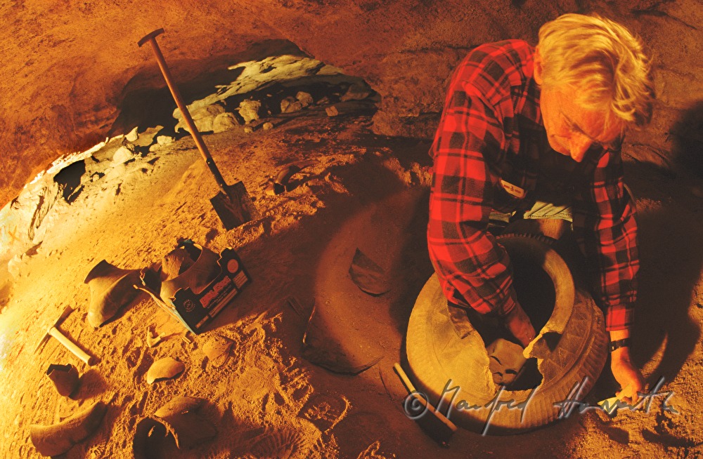 archeologist finding pottery in the 
