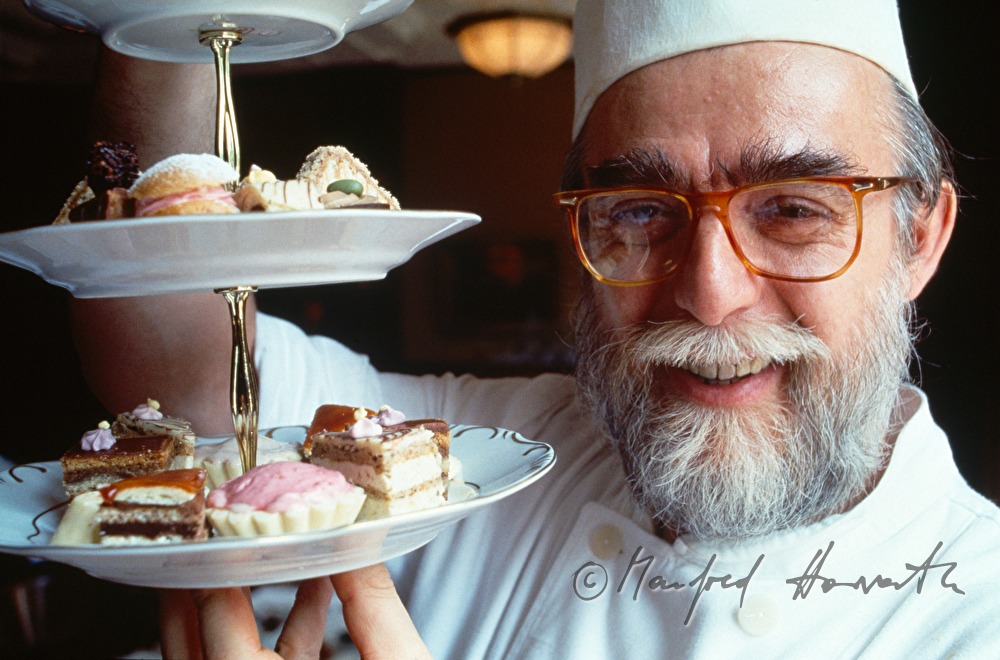 chef confectioner with sweets