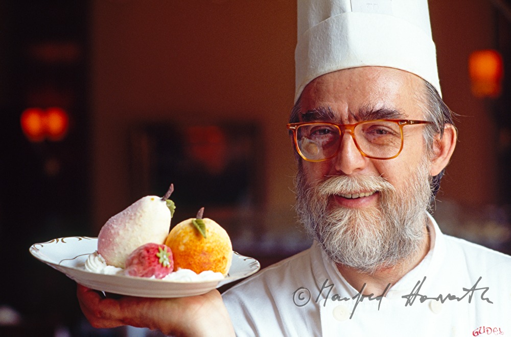 chef confectioner with sweets