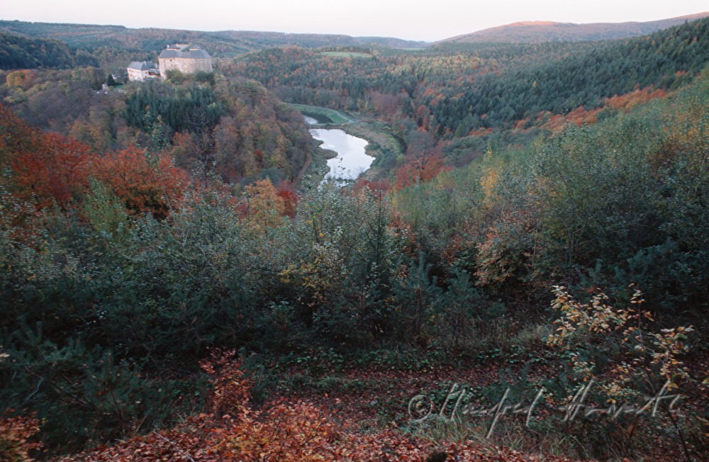 view from the Kőszeg Mountains to castle and lake