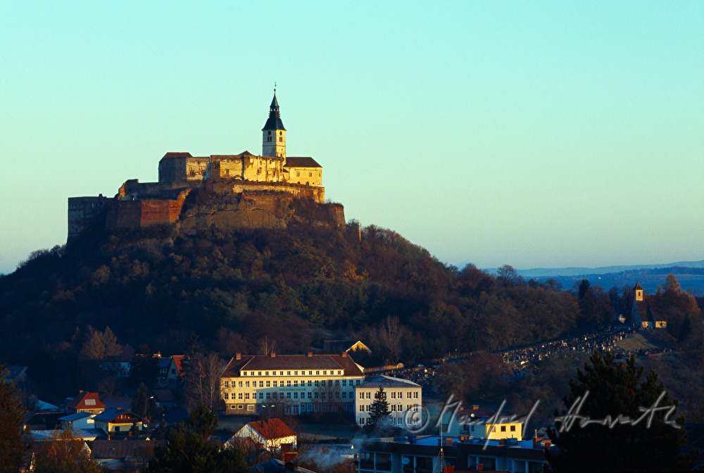 castle on top of a porphyry cone