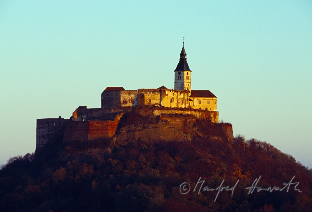 castle on top of a porphyry cone
