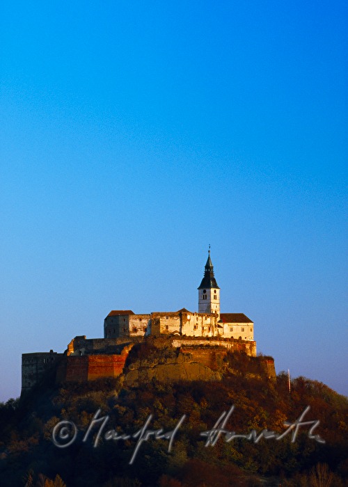castle on top of a porphyry cone