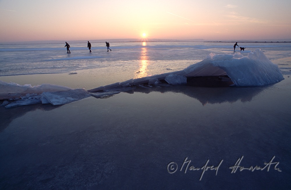 ice skaters near an ice jam