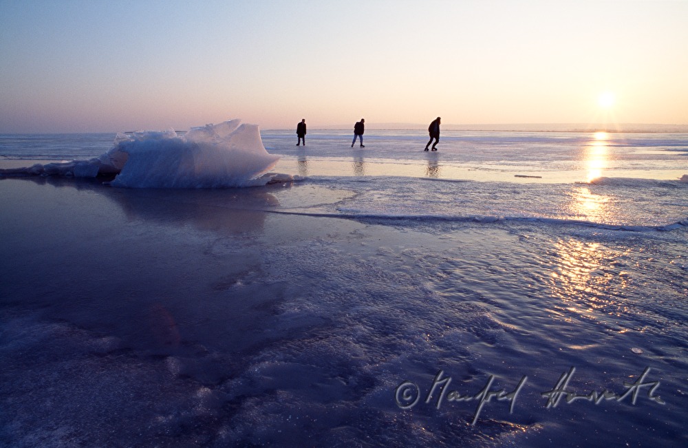 ice skaters near an ice jam