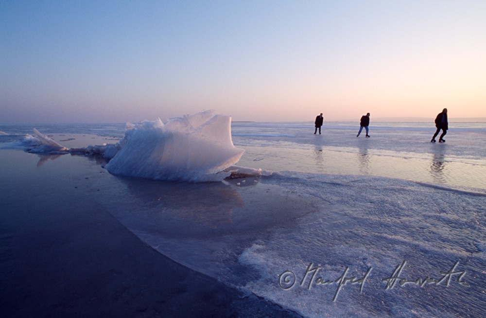 ice skaters near an ice jam