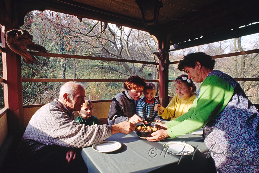 family eats baked apples
