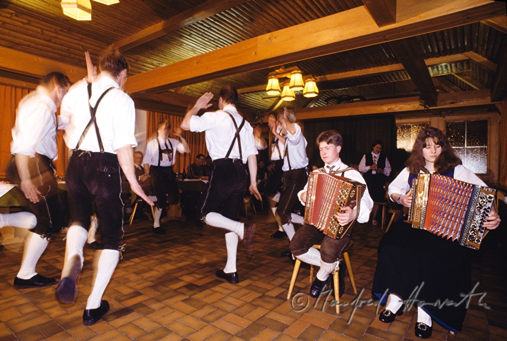 Schuhplattler dancers in a pub