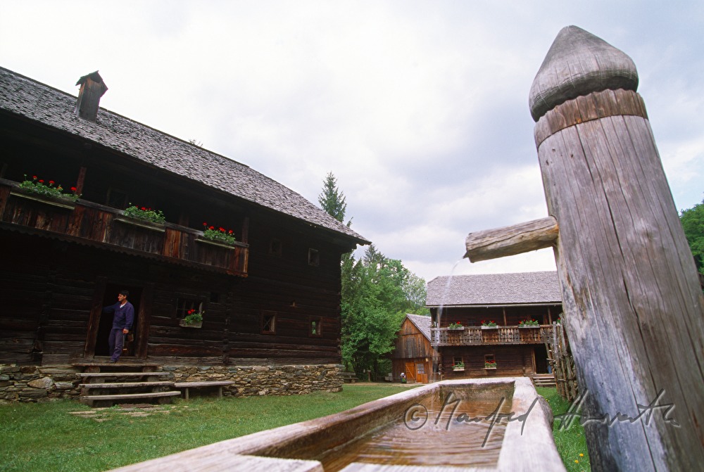 farmhouse and fountain from the 18th century