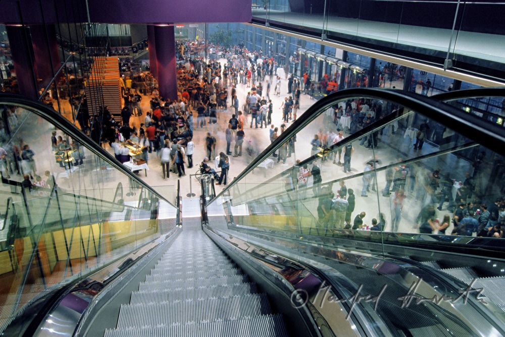 escalator and audience in a break