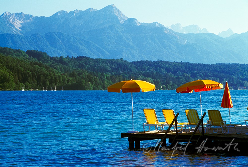 beach and sunshades in Poertschach