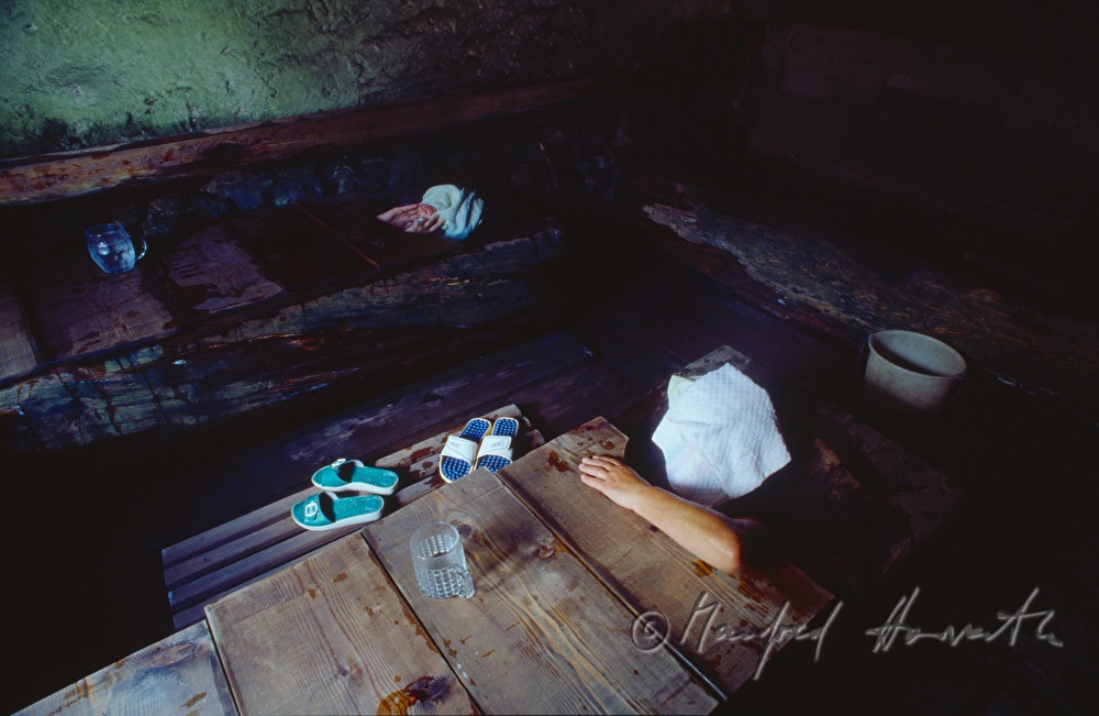 spa visitors in wooden bath tubs