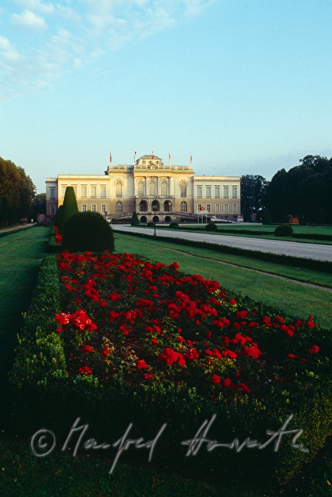 main entrance and park with rose flower bed