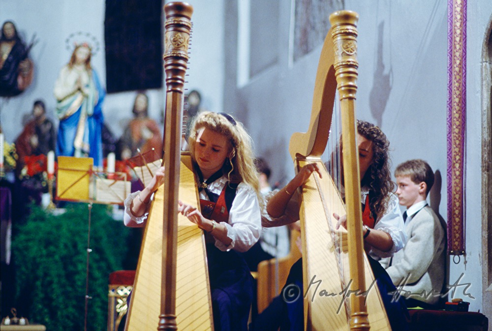 harp players in the church