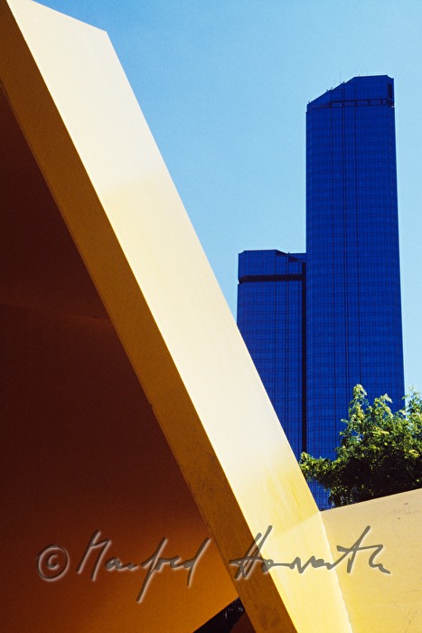 office building and yellow sculpture