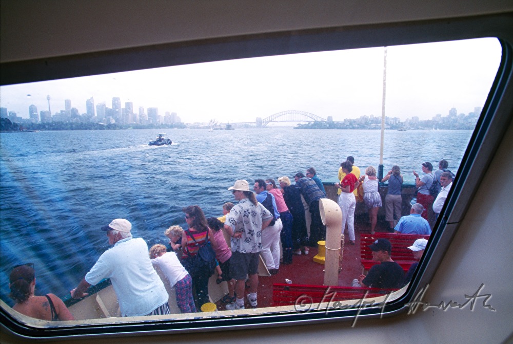 passenger ferry passes the Sydney Opera House