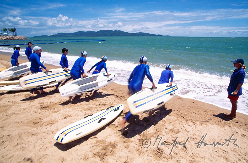 surf lifesavers training on the beach