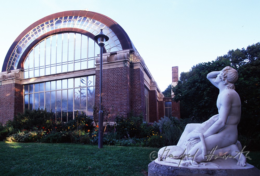 palm house with garden sculpture