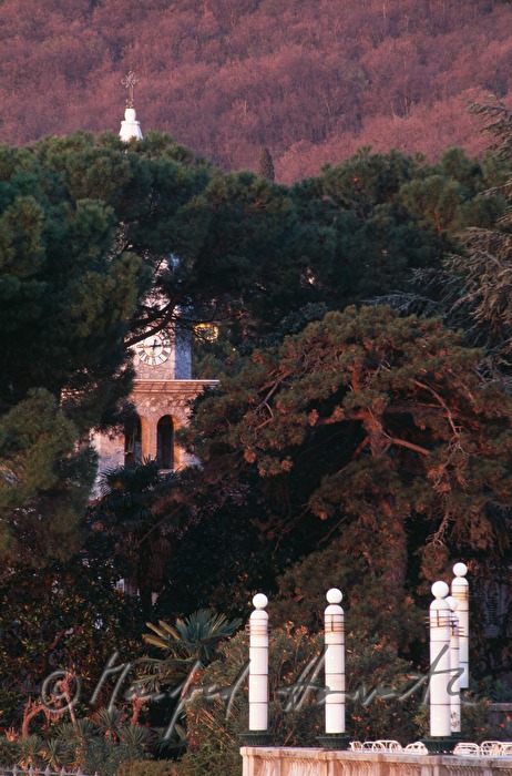 columns of Hotel Kvarner and church