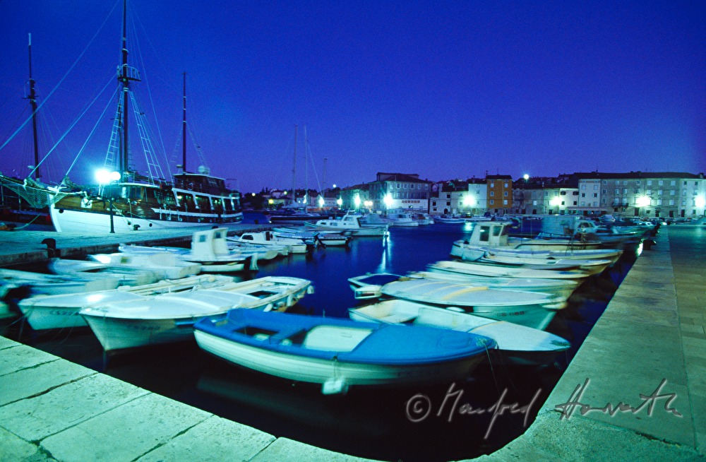 harbour and boats in the town Cres