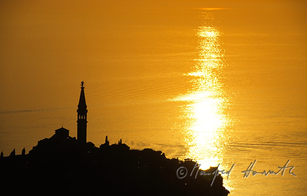 Church Saint Eufemia and sun