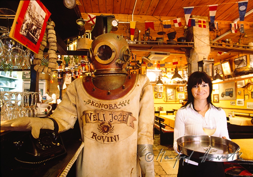 waitress presents a drink