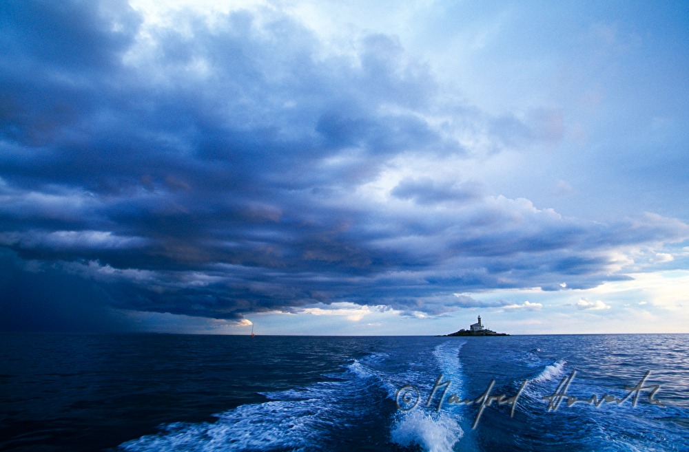 lighthouse Sveti Ivan and thunderclouds
