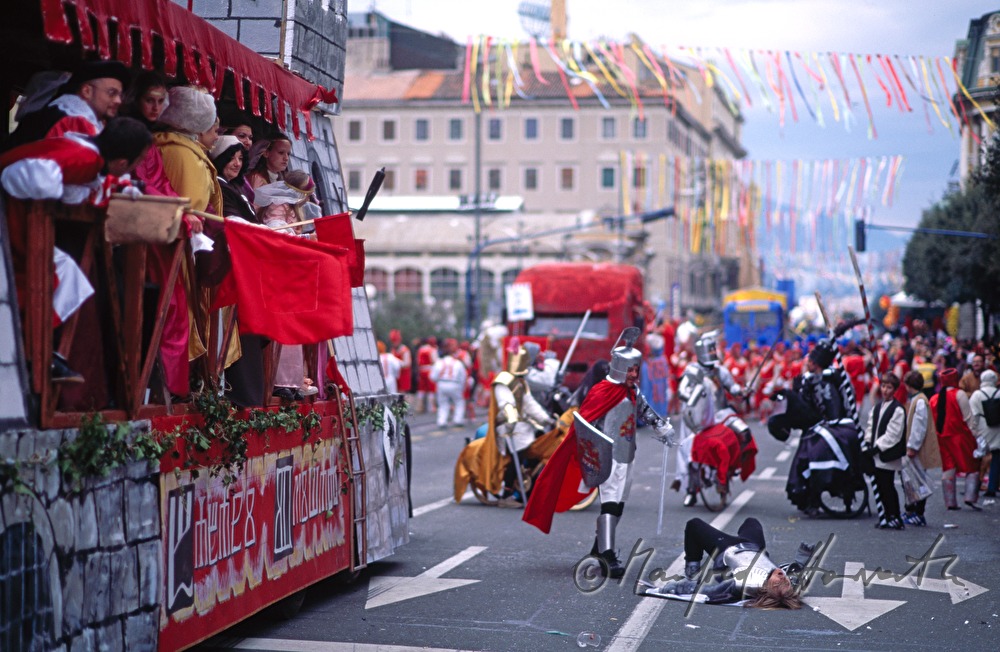 Spectators watch a carnival show.