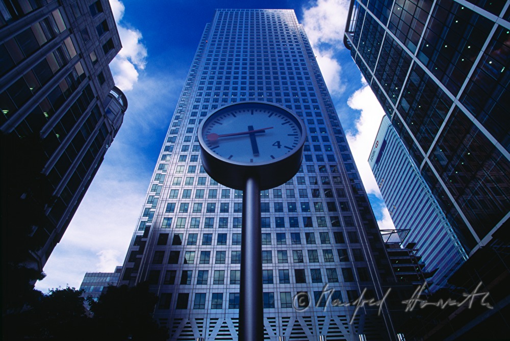 clock between two skyscrapers