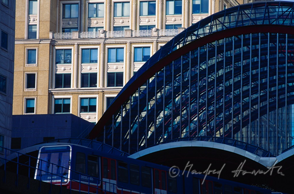 detail of a train-bridge and office building