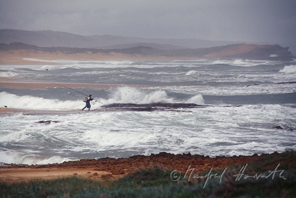 fisherman on the shore of the Atlantic Ocean