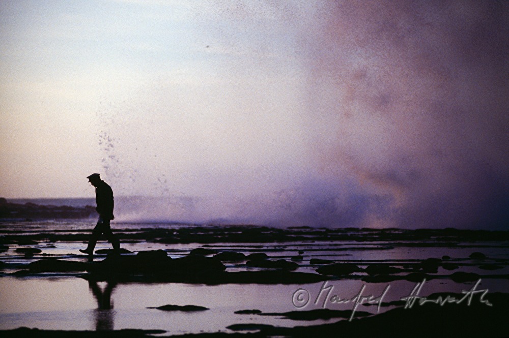 fisherman on the shore of the Atlantic Ocean