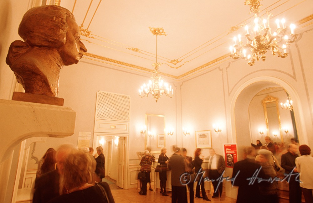 audience during break in foyer
