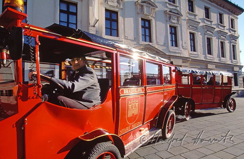 tourist guide tour with an oldtimer bus