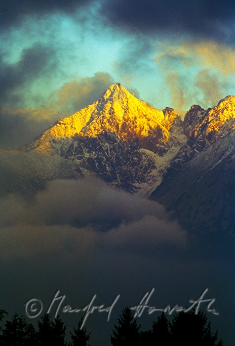 mountaintop and clouds