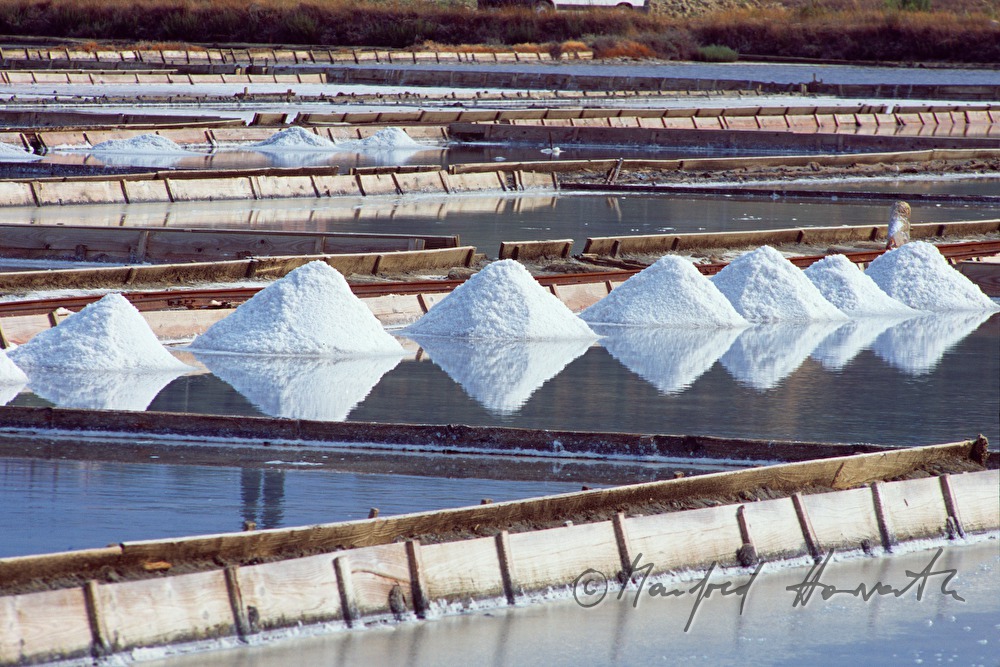 salt evaporation ponds: heaps of salt