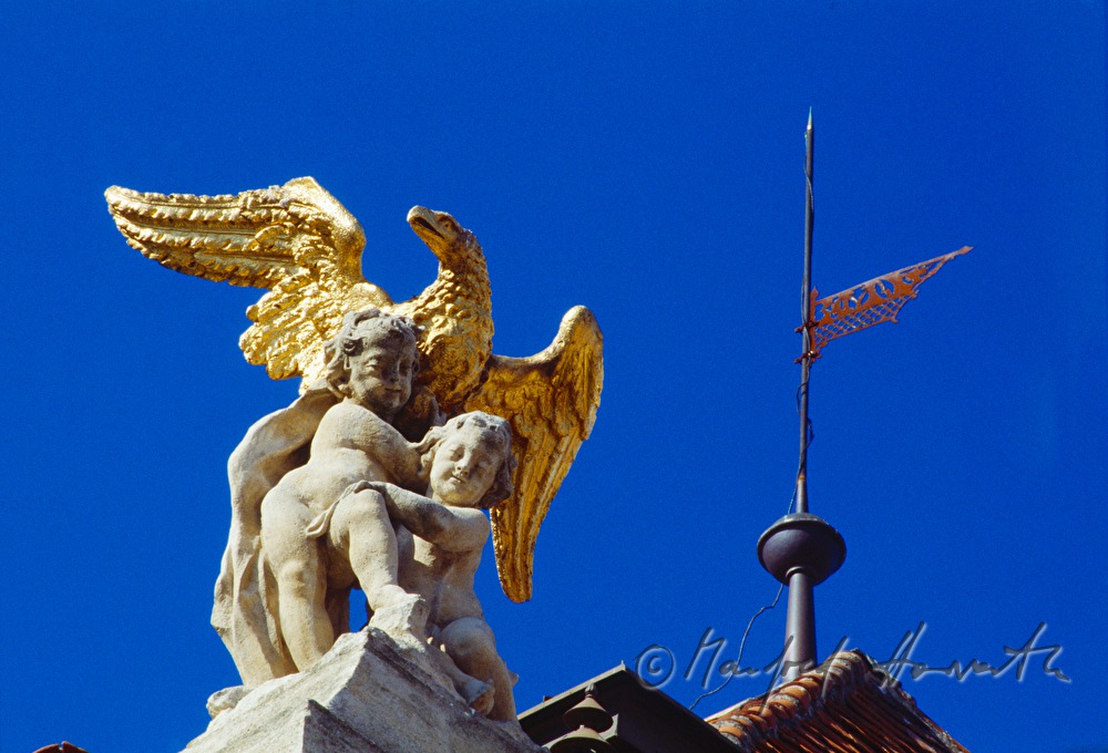 garden sculpture with putto