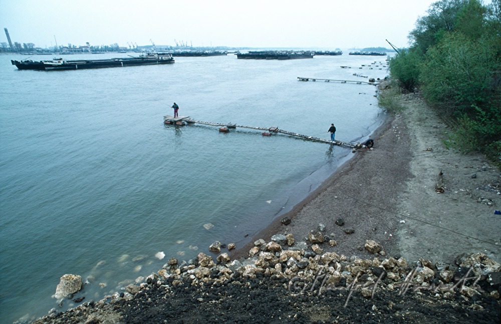 fishermen on a swimming pontoon