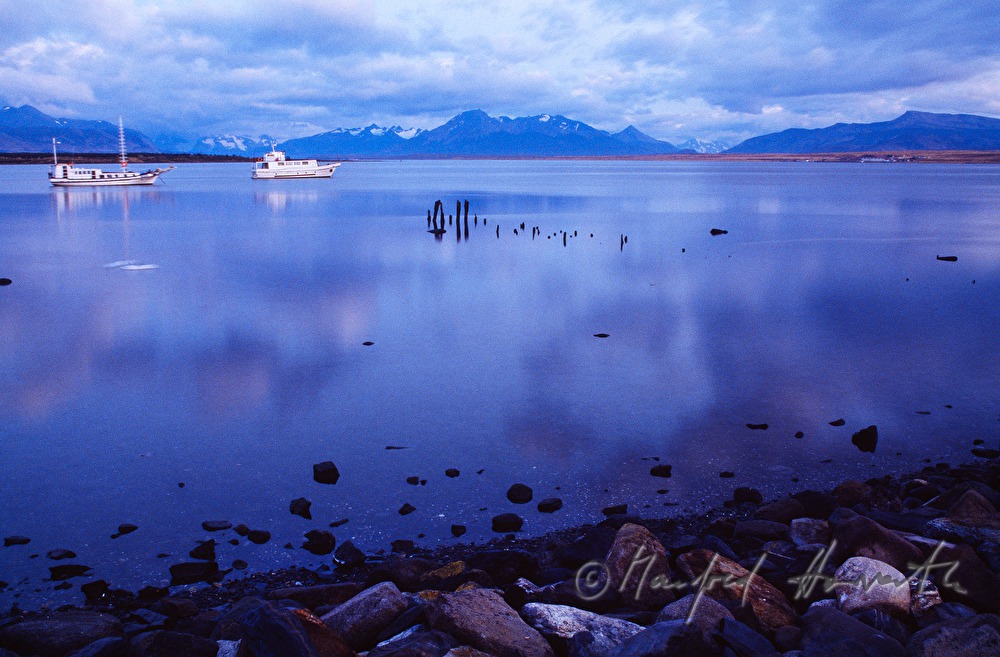 fishing boats in the harbour of Puerto Natales