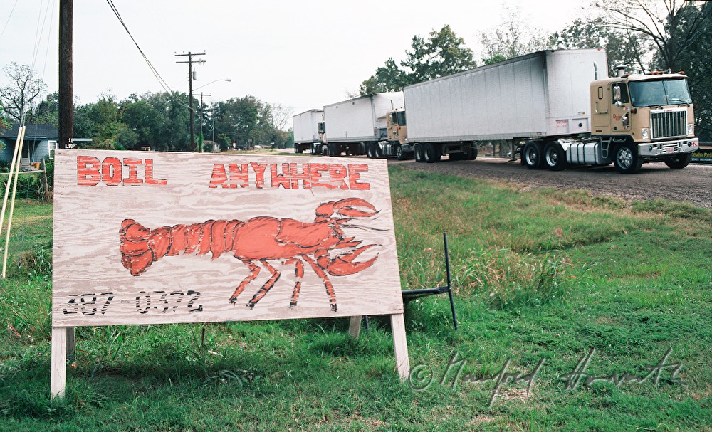 Route 55, truck passes a lobster sign