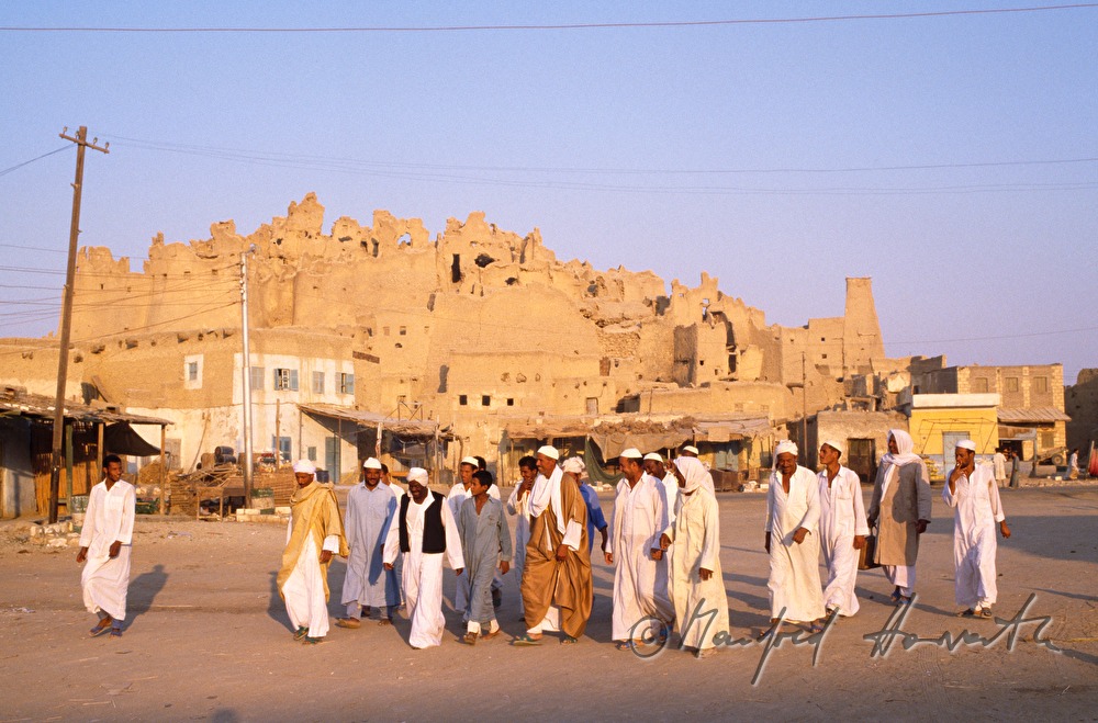 group of men and old clay town
