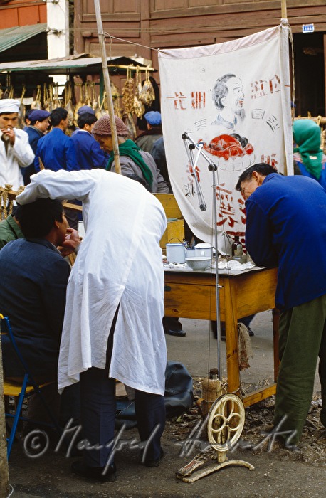 dentist working on the market