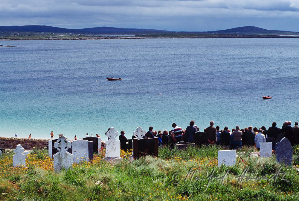 funeral on cemetery with ocean view