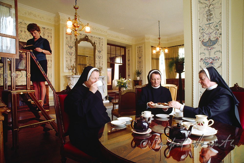 Benedictine nuns have tea in the library