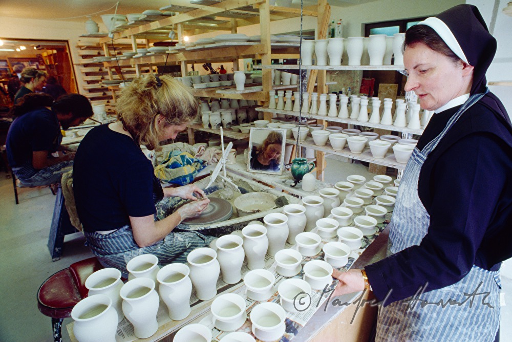 Benedictine nun in the pottery of the monastery