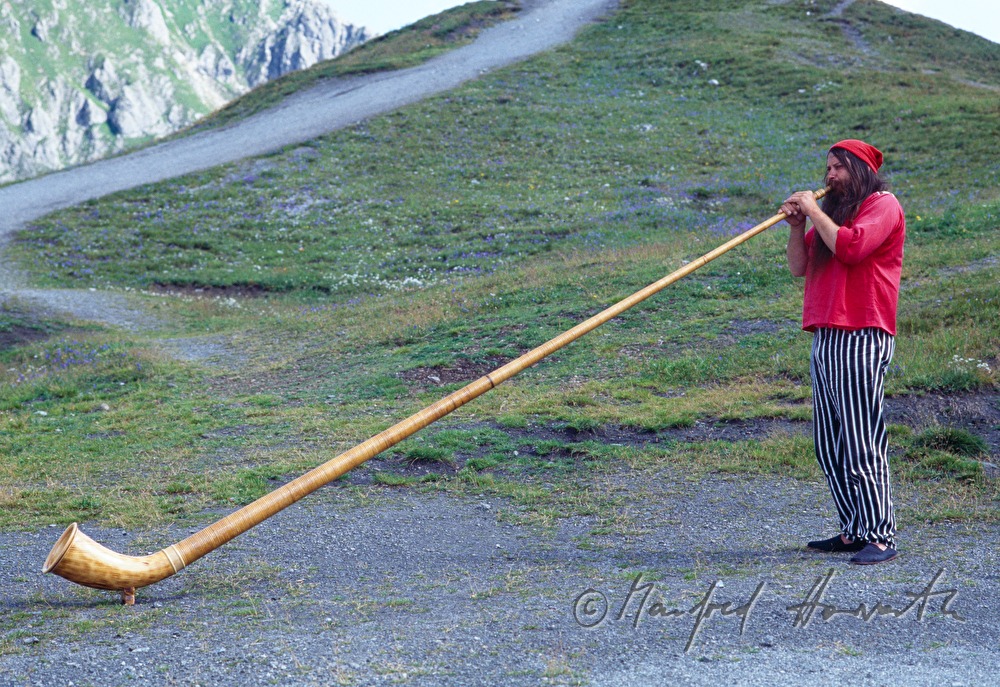 alpine horn player on the Strelaalp