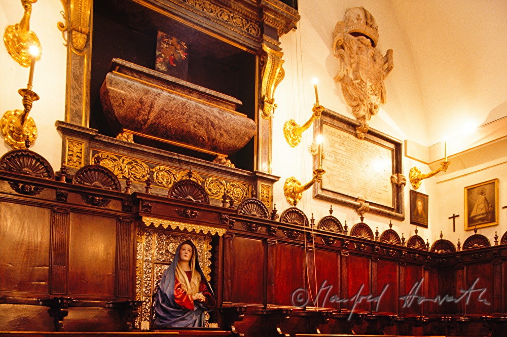 seats and coffin in the prayer room