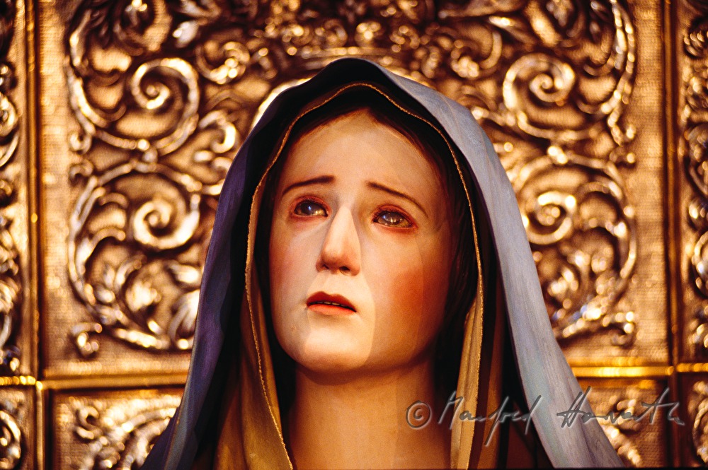 sculpture of a weeping Madonna